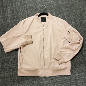 Woman’s Zara Basic lightweight bomber jacket.